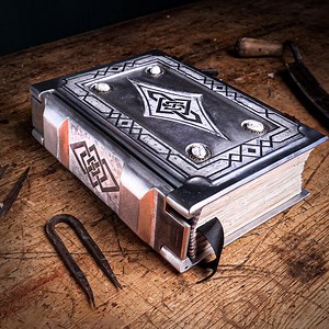 We Made an Epic Metal-bound Book / Tome!! Like - it's real metal... talk about heavy reading 😂 But seriosuly I think it turned out awesome in the end!! Imagine having Lord of the Rings bound like this 🤩 Couldn't have done it without Black Beard Project who casted the covers! | Nerdforge