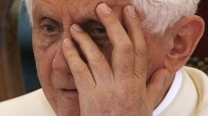 Papal resignation leaves Vatican with crosses to bear