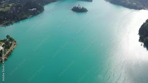 lake bled drone aerial Pilgrimage Church of the Assumption of Mary In . Bled Island In Slovenia With bled Castle Museum On Precipice And Rocky Mountain 4k Footage raw summer Virgin Mary