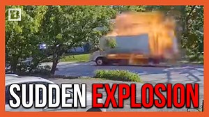 A security camera from a house captured shocking footage of a truck suddenly exploding right in the middle of a neighborhood in Addison, IL, miraculously only causing minor injuries to the driver. Investigators believe the explosion was due to a leaking propane tank. | Breitbart