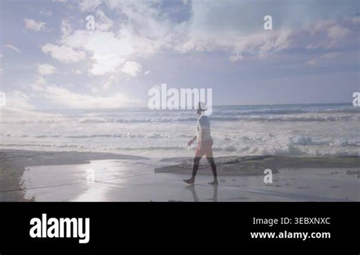 Mature man appearing with ghosting, walking barefoot on shore, leaving wet-sand prints for wellness. Beach, waves, horizon, sunlit, reflection, footprints, tidalpool Stock Video Footage - Alamy