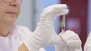 Scientist Checks the Medication. Doctor Considers the Cure. Medication Check Stock Video - Video of analytical, medicine: 89607579