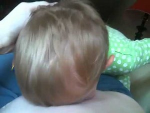 Fletcher blows raspberries on pregnant tummy