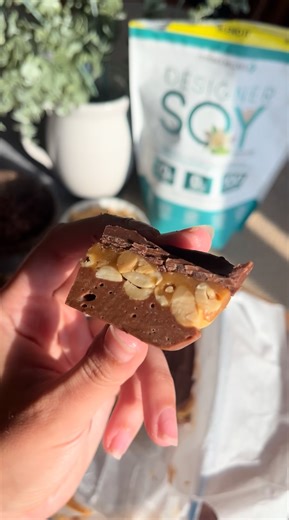 Hungry? Why wait? 🍫😋 Kick cravings to the curb with these Homemade Protein Snickers Bars, made with Designer Whey protein powder. Gooey caramel, crunchy peanuts, rich chocolate, and protein power 💪 this is the snack your sweet tooth and fitness goals can both agree on! Check out the full recipe through the link below! https://bit.ly/3UbIISd #designerwellness #designerprotein #designersoy | Designer Wellness