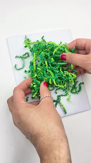 This Easter candy box is so simple to make. I hot glued 4 equal sized boxes of candy onto a piece of cardboard, added Easter grass and topped that with more treats. 🐣 #eastercrafts #diycrafting #craftidea #craftlove #craftymomma #eastertreats #craftersgonnacraft #gluegun #makersgonnashare #craftybitch #eastertime #crafttime #craftaddict #craftblogger #easterfun #craftaholic #crafters #craftygirl #dıy #easterbaskets #craftproject #craftlife | thediyday