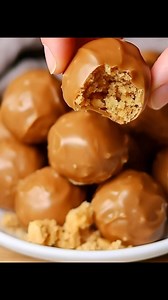Homemade Butterfinger Balls room temperature or place the baking sheet in the refrigerator to speed up the process. Once the chocolate is set, your Homemade Butterfinger Balls are ready to enjoy! To make perfect Butterfinger Balls, use fresh ingredients, especially peanut butter and crispy rice cereal, for optimal flavor and texture. Recipe in First Coʍmеոτ 👇 Enjoy ❤️👇👇👇 | Easy Recipes