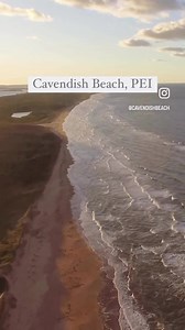 Soaring above the stunning beauty of Cavendish Beach! Where the gentle waves meet the golden sand, is nothing short of breathtaking. 🌊 | Cavendish Beach