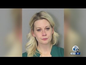 Woman accused drunk driving on train tracks
