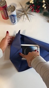 Dreaming of being a wrap star this Christmas? First off, learn how to nail the one-bit-of-sellotape method 🎁 | Boost Drinks