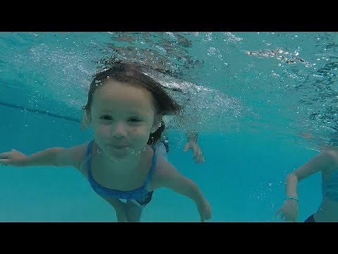 Kids Swimming Underwater