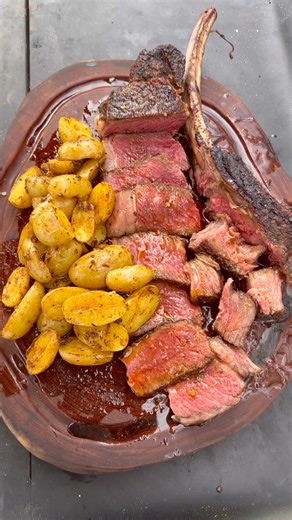 931K views · 40K reactions | Grilled tomahawk steak with Cajun potatoes | Miguels cookingwithfire | Facebook