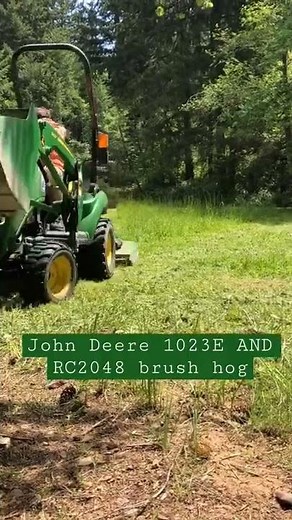 John Deere 1023E and RC2048 brush hog