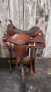 Check out model B23-408! This saddle has a 16 1/2” chocolate smoothout seat with a 1.25” CW border with Scottsdale tooled corners. It has the 6500 conchos with matching rear dees and is finished in the antique medium oil. Contact Cowdog saddles for additional information! #rideabobs #cowdogsaddles #bobscustomsaddles #teambobs #bobsnation #reiningsaddles #reining #nettlesstirrups #westernsaddles #customsaddles | Bob's Custom Saddles