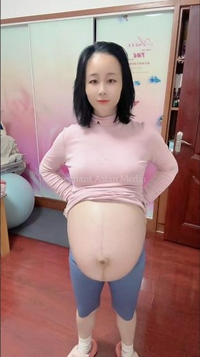 Pregnant Asian Mom 9 Months Showing Baby Bump