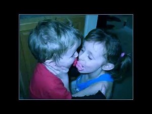 Kids hug and kiss