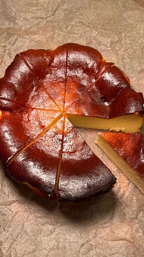 Basque Cheesecake 🧀 Ingredients: 6 or 7-inch pan with parchment paper. 16 oz cream cheese (~450 gm) 3 eggs 3/4 cup sugar (~150 gm) 3/4 cup cream (~200 ml) 1/4 tsp salt 1 tsp vanilla 3 tbsp all-purpose flour Note: Every ingredient is at room temperature. 1. Preheat oven to 450°F (230°C). 2. Mix in cream cheese and sugar. Whisk eggs one at a time. 3. Add cream, salt, and vanilla. Add flour (optional). 4. Bake on the middle rack of the oven for 50-55 mins or until the top part is very dark. Center