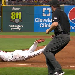 Santana dives for the out