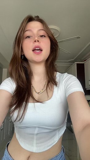 Stylish Kitchen Looks: Young Woman in Casual Fashion