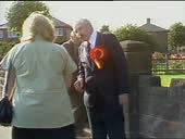Shots of campaigning for Warrington by-election; MS Douglas Hoyle...