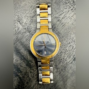 Gucci Gold and Silver Luxury Watch/unisex