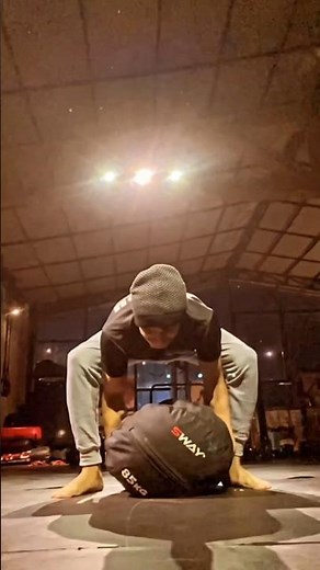 Heavy SandBag Toss over Shoulder #sandbags #sandbagtraining #strength