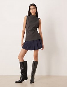 ASOS DEIGN - Minigonna a pieghe color blu navy con vita scesa | ASOS