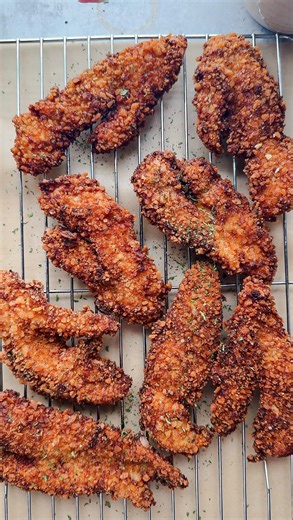Laura Vitale on Instagram: "I’m weakkkkkkk for a chicken tendi and these bang bang chicken fingers have me in a chokehold! You must make them!! Recipe below and full video on the tube! 1.5lb chicken tenders 2 eggs Splash of milk 2 tbsp Sweet chili sauce 1 tsp sirarcha 1.5 cups panko 3/4 cup flour Garlic and herb seasoning to taste Paprika to taste S&P to taste Frying oil of choice For the sauce: 3/4 cup Mayo 1/4 cup sweet chili sauce 2 tsp sirarcha 2 tsp honey Pinch salt"
