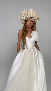 This minimalist #VeraWangBride princess wedding dress crafted in mikado with a signature oversized shoulder bow featuring a pleated princess skirt with soft tulle insert. https://bit.ly/3viPYCm #租婚紗 #婚紗租借 | Designer Bridal Room, Hong Kong