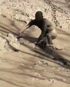 Guy Bellyflops Into Puddle of Mud - 988398