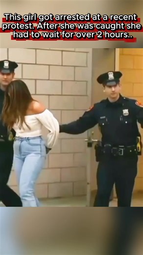 This girl got arrested at a recent protest . After she was caught she had to wait for over 2 hours.. #handcuffs #handcuffed #cops #police #handcuffedwoman