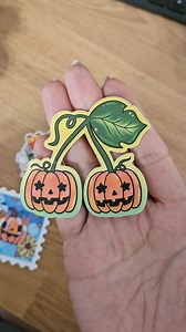 Our freebie sticker for September orders is here! It's a cherry jack-o-lantern! I had it available a year or two ago for a very brief period of time and wanted to bring it back for everyone. I am so glad I started the freebie sticker of month idea. Its so fun adding something extra to every order and a great way for me to get to experiment with some silly random art. 🎃🍒 Happt September babes! #stickers #unboxing #stationery #jackolantern #cherry | Jem and Cozy