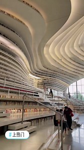 Wow!! Books anywhere 📚📚 Tianjin Binhai Library is one of the wonderful places to visit in China as it serves both as an architectural wonder and a study ✨ 📍Binhai library, Tianjin . #china #tianjin #binhai #library | HiChina Travel