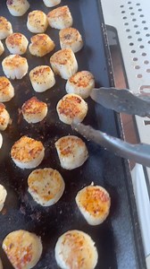 Steak, Scallops, Shrimp, and Asparagus on the Flat Top | GrillinFools.com