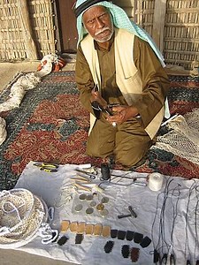 Free Diver Diving for Pearls