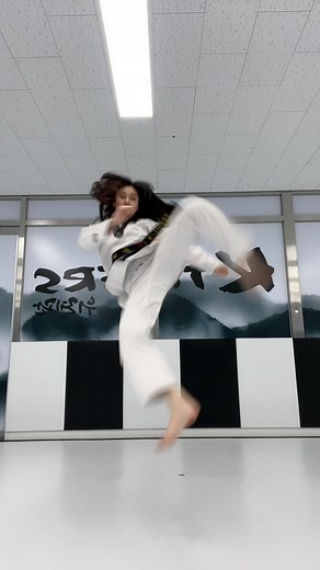 Young Female Martial Artist Demonstrates Karate Skills