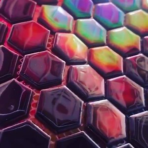 Here’s a quick video of the finished color changing backsplash tile we made using our Liquid Crystal. We used epoxy resin to lock in the effect which also gives it a nice glossy look! You can see the color changing back from the cold as we placed it in a freezer for the effect!😄 www.SolarColorDust.com #solarcolordust #colorchange #backsplash #tile #carpentry #homeimprovement #showerdesign #kitchendesign | SolarColorDust.com