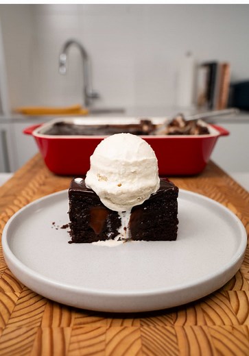 Hot Chocolate–Soaked Chocolate Cake This cake borrows the soaking technique of tres leches and applies it to hot chocolate. With the magic ingredients of local milk, cream and butter the result is an extremely moist chocolate cake that absorbs a rich cocoa soak and finishes with a smooth chocolate ganache. Ingredients 3 large eggs 1 cup Ontario 2% milk ¾ cup unsalted Ontario butter, melted and slightly cooled 1 cup granulated sugar 1½ cups all-purpose flour ¾ cup unsweetened cocoa powder 1 table