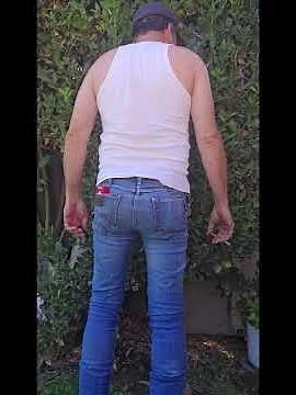 Smoking in tight lycra shorts showing a bulge