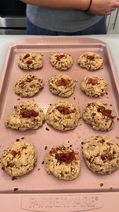 These bacon chocolate chip cookies were so good Olivia uses bacon bits, bacon grease, brown and white sugar, flour, egg, milk and chocolate chips to make a yummy dessert This original video was produced by Network Media LLC and Olivia | Olivia