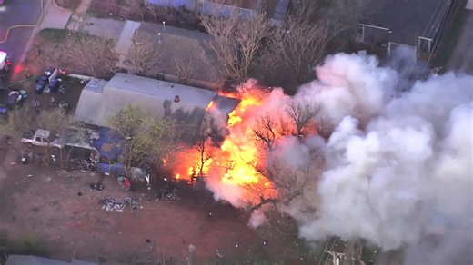 Sky 5 pilot Chase Rutledge describes crews battling large flames in NW OKC