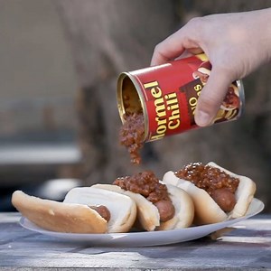 Chili Nation embraces National Hot Dog Day: A day when we recognize the important role dogs play in our lives. So go ahead, smother your dog with delicious HORMEL® Chili. What else are you topping it with? | Hormel Chili