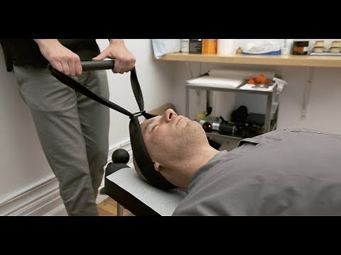 Y Strap Adjustment in NYC - Chiropractors Adjust With the Y-Strap