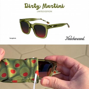 The Dirty Martini Songbirds: translucent olive green frames kissed with ruby and emerald garnish.  Polarized black to red faded ember lenses, like a Manhattan sunset through smoked glass. These sunglasses were made for the velvet hour—that moment between cocktails and consequences when the city lights flicker on and anything feels possible.  Limited release—Once the bottle's empty, it's gone! | Knockaround Sunglasses | Facebook