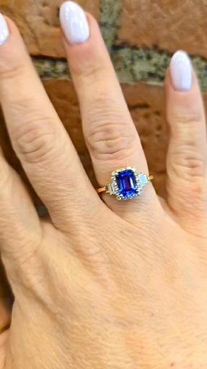 A pop of color, a touch of sparkle ✨ Our emerald-shaped tanzanite ring, accented with diamonds and set in 14k yellow gold, is the perfect balance of bold and refined. The rich blue-violet hue of the tanzanite paired with the warm gold and sparkling diamonds creates a ring that’s truly one-of-a-kind 💎💙 #tanzanite #tanzanitejewelry #ring #diamond #yellowgold #DesignsByAaron #jewelry #customjewelry #uniquejewelry #finejewelry #jewelrylover #fyp #foryoupage #foryou | Designs By Aaron