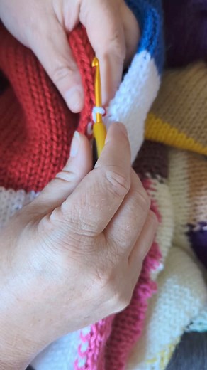 Crocheting two knitted tubes together. I have made several large blankets using this technique. Love the way it turns out. #crochet #knit #blanket #joining #afghan #crocheting #knitting #fyp #trending #viral | So Totally Us
