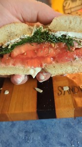 1.3K views · 89 reactions | MY Half assed, whole hearted version of "The Tomato" Sandwich from @turkeyandthewolf I put it on a bagel and added cream cheese, because why not mess with perfection in favour of personal preference  #tomatosandwich #thetomato #sandwichdad #sandwichesofinstagram #sandwichgram #turkeyandthewolf #fyp | The Sandwich Dad | Facebook
