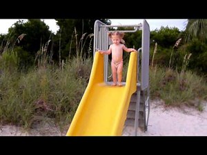16 month old baby masters the slide.MOV