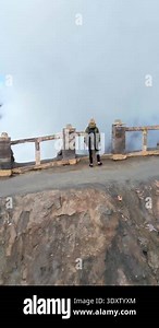 Aerial view of Matera, Italy. Woman standing on the cliff