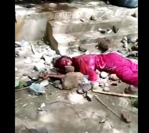 Nigerian female student stoned and burned alive for blasphemy - XGore - Extreme Gore Videos