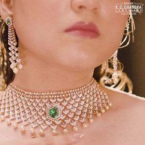 4.5K views · 398 reactions | Let the diamonds dance as you party in style! This exquisite diamond jewellery set is a perfect choice for a wedding reception that's all about glamour and celebration. Check these stunning masterpieces on https://pcchandraindia.com/ #PCChandraJewellers #PCCJ #diamondjewellery #diamondnecklace #diamondearrings #diamondbracelet #diamondring | P.C. Chandra Jewellers | Facebook